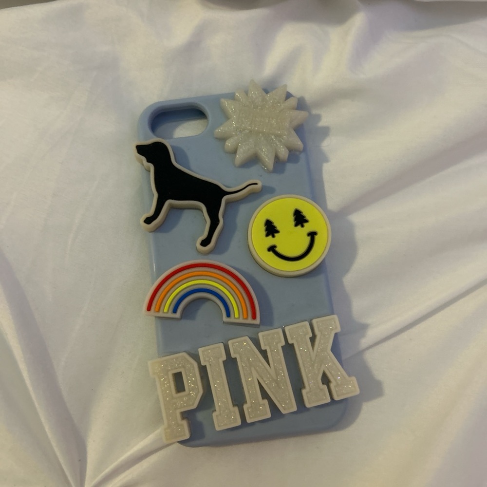 PINK VS iPhone SE phone case
lights up when press the smiley face